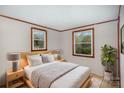 Comfortable bedroom with ample natural light and modern decor at 3660 Fieldcrest Nw Cir, Concord, NC 28027