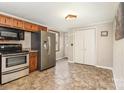 Functional kitchen with stainless steel appliances and ample cabinet space at 3660 Fieldcrest Nw Cir, Concord, NC 28027
