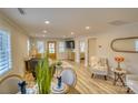 Spacious living room with an open floor plan, hardwood floors, and neutral decor at 1532 South Point Rd, Belmont, NC 28012