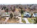 Aerial view of a neighborhood with waterfront homes and access to the lake at 156 Hazelton Loop, Mooresville, NC 28117