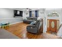 Cozy living room with hardwood floors, plush seating, and plenty of natural light at 2200 Peninsula Ave, Shelby, NC 28150