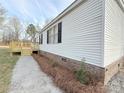 The property has a well maintained exterior, with a new deck and a brick foundation at 288 John L Hudson Sr Rd, Lancaster, SC 29720