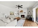 Inviting living room with a fireplace, built-in shelving, and contemporary decor at 766 Marsh Rd # Apt 2, Charlotte, NC 28209
