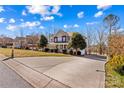 Lovely home featuring a spacious driveway and a welcoming front porch, set in a desirable neighborhood at 137 Hunters Hill Dr, Statesville, NC 28677