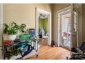 A bright and functional entryway featuring hardwood flooring and views into the home at 201 Marion St, Clover, SC 29710
