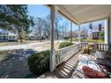 Inviting front porch with classic railings, offering a relaxing outdoor space at 201 Marion St, Clover, SC 29710
