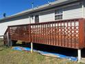 Spacious wooden deck perfect for outdoor entertaining and relaxation, surrounded by a well-maintained yard at 376 Brookgreen Nw Pl, Concord, NC 28027