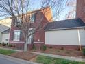 Charming brick two-story home with landscaped front yard and sidewalk at 508 Summerfield Pl, Belmont, NC 28012