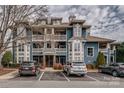 Exterior shot of a multi-Gathering complex with attached parking at 623 Olmsted Park Pl # D, Charlotte, NC 28203