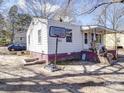 This home features a backyard and a basketball hoop for leisure and outdoor activities at 701 N Scruggs St, Gastonia, NC 28052