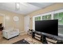 Cozy living room with a large window, neutral walls, and comfortable seating arrangements at 133 Proctor St, Gastonia, NC 28052