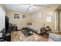 Bright living room with neutral walls, a plush rug, and comfortable seating with natural light at 133 Proctor St, Gastonia, NC 28052