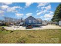 Expansive backyard with a large patio and plenty of room for activities at 240 Old Limestone E Rd, York, SC 29745