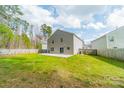 Large backyard with new patio and privacy fence at 5306 Graypark Dr, Charlotte, NC 28269