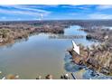 Aerial view of the lakefront property highlighting its expansive waterfront and natural surroundings at 7262 Right Angle St, Sherrills Ford, NC 28673