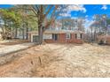 Charming brick home with mature tree and inviting front yard at 1502 Northwoods Dr, Kings Mountain, NC 28086