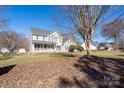 Beautiful two-story home with landscaped front yard and inviting covered porch at 280 Bonaventure Dr, Salisbury, NC 28147