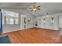 Bright, open living room with wood floors, vaulted ceilings, and lots of space at 11000 White Stag Dr, Charlotte, NC 28269