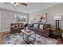 Inviting living room featuring neutral tones, modern decor, and a stylish area rug at 130A Springway Dr, Kannapolis, NC 28081