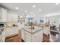 Spacious kitchen featuring granite countertops, stainless appliances, and a center island at 14621 Brannock Hills Dr, Charlotte, NC 28278