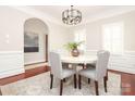 Elegant dining room with stylish chandelier and neutral tones at 1512 Pecan Ave, Charlotte, NC 28205