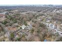 Aerial view of the townhome community, showcasing its proximity to the city and surrounding green spaces at 3010 Uxbridge Woods Ct, Charlotte, NC 28205