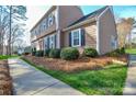 Well-maintained home featuring tidy landscaping and a classic design, capturing suburban charm at 916 Somersby Ln, Matthews, NC 28105