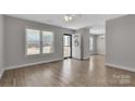 Bright and airy living room with wood-look floors and a welcoming entrance at 2211 Waverly St, Albemarle, NC 28001