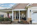 Cozy front porch with comfortable seating and decorative touches at 313 Garner Dr, Salisbury, NC 28146