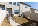 Backyard space with a small patio and fence at 5341 Orchid Bloom Dr # 55, Fort Mill, SC 29707