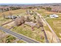 Expansive aerial view of a ranch home on a sprawling lot with mature trees at 5830 W Nc 10 Hwy, Hickory, NC 28602