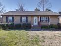 Charming brick home with well-maintained landscaping and inviting front entrance at 1120 Glenarden Dr, Rock Hill, SC 29730