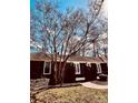 Inviting home with brick facade, manicured shrubs, and a well-maintained lawn leading to the front entrance at 3580 5Th Ne St, Hickory, NC 28601