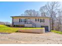 Charming brick home with a well-maintained front yard and an attached garage at 108 Spiral Ln, Shelby, NC 28152