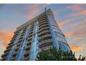 Upscale condo building exterior boasting private balconies with cityscape views at 505 E 6Th St # 804, Charlotte, NC 28202