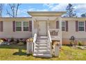 Close up of the porch, showcasing the front entry and charming details, such as flower boxes at 8742 Belt Ln, Fort Mill, SC 29707