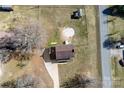 An aerial view of the brick home on a spacious lot, showcasing its well-kept exterior at 305 Plantation Dr, Kings Mountain, NC 28086