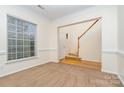 Neutral room with crown molding, chair rail and a view of staircase at 3612 Brookstone Trl, Indian Trail, NC 28079