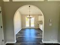 Dining room features hardwood floors and chandelier lighting, with access to kitchen at 4232 Cornelia Ln, Rock Hill, SC 29732