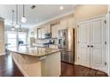 Spacious kitchen featuring a large island, granite countertops, stainless steel appliances at 120 Sycamore Dr, Lancaster, SC 29720