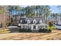Aerial view of a beautiful single-Gathering home showcasing its expansive lot and traditional architectural style at 607 Beaten Path Rd, Mooresville, NC 28117
