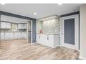 Bright open floor plan showcasing the beautifully remodeled kitchen with stainless appliances at 98 Ring Sw Ave, Concord, NC 28025