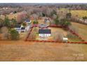 An aerial shot reveals property lines and their relation to neighboring homes at 134 Falling Leaf Ln, Statesville, NC 28677