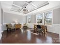 Bright office with coffered ceilings, hardwood floors, large windows, and decorative trim at 13925 Helen Benson Blvd, Davidson, NC 28036
