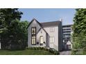 Elegant two-story home with a manicured front lawn, dark window frames, and a side garage, showcasing modern curb appeal at 1645A Lombardy Cir, Charlotte, NC 28203