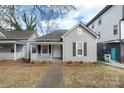 Charming single-Gathering home with covered porch and brick walkway at 312 Flint St, Charlotte, NC 28216