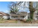 Charming single-story home with a covered front porch and walkway leading to the entrance at 314 Flint St, Charlotte, NC 28216