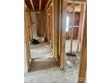 Interior framing of a home under construction with exposed wood studs and insulation at 1174 Trexler Rd, Salisbury, NC 28146