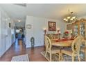 Open dining room with a view into the kitchen and beautiful hardwood floors at 137 Mossy Pond Rd, Statesville, NC 28677