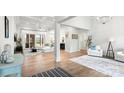 Bright, open living space featuring modern hardwood floors and abundant natural light at 4034 Sagemont Nw Dr, Concord, NC 28027